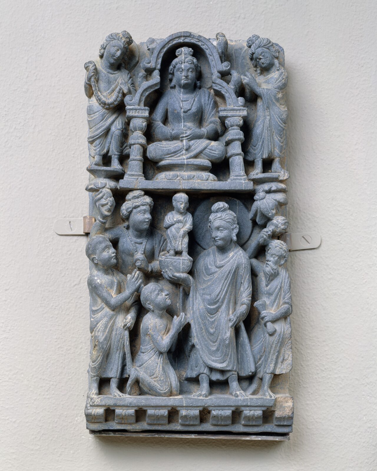 Carved stone relief panel